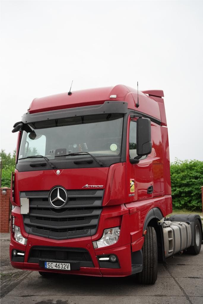 Red Mercedes-Benz Actros 1845 tractor unit parked